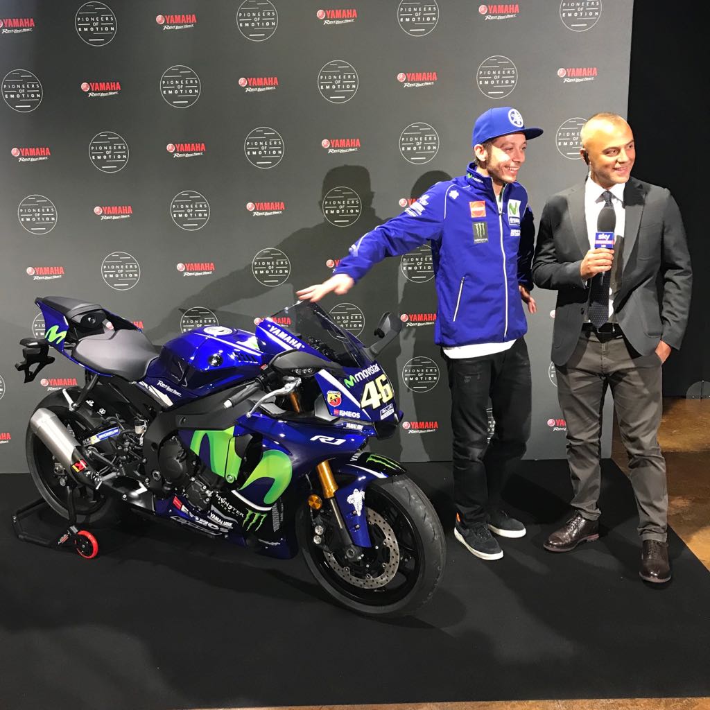 YamahaMotoGP's tweet photo. Some 'post-EICMA presentation' interviews for @ValeYellow46 before he's off. Next stop: the #ValenciaGP. #PioneersofEmotion #MovistarYamaha https://t.co/sH7kldChn6