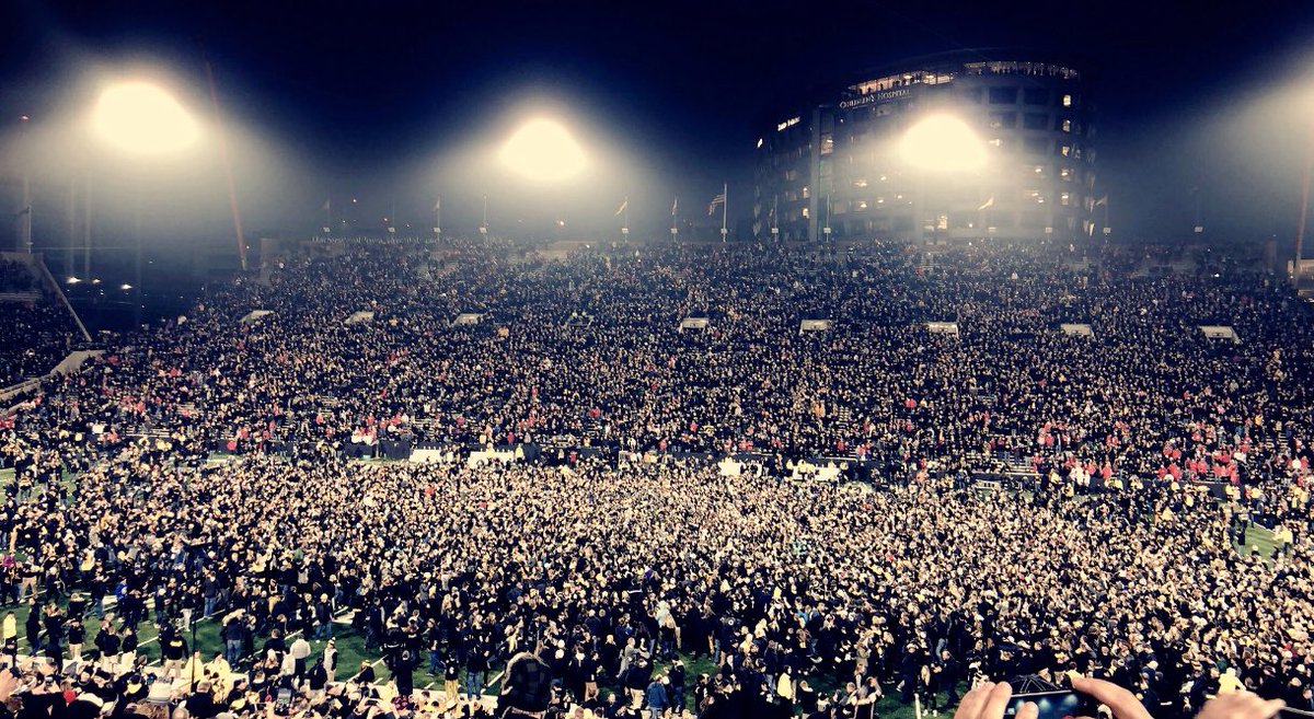 darrenrovell's tweet photo. Photo Of The Day: Epic storming by Iowa fans after an unbelievable result (📷 by @ktbrown3) https://t.co/upL0NhAbcH