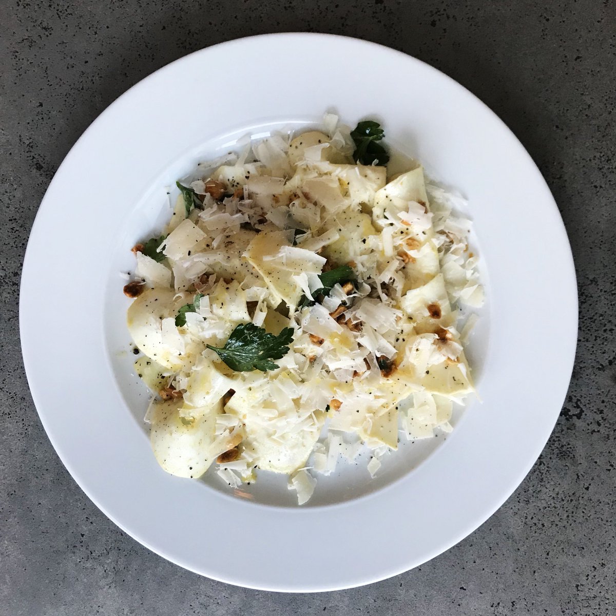 Shaved Celery Root Salad with Roasted Hazelnuts, Parsley, Lemon, Cappezana Olive Oil &amp; Parmigiano Reggiano 👌