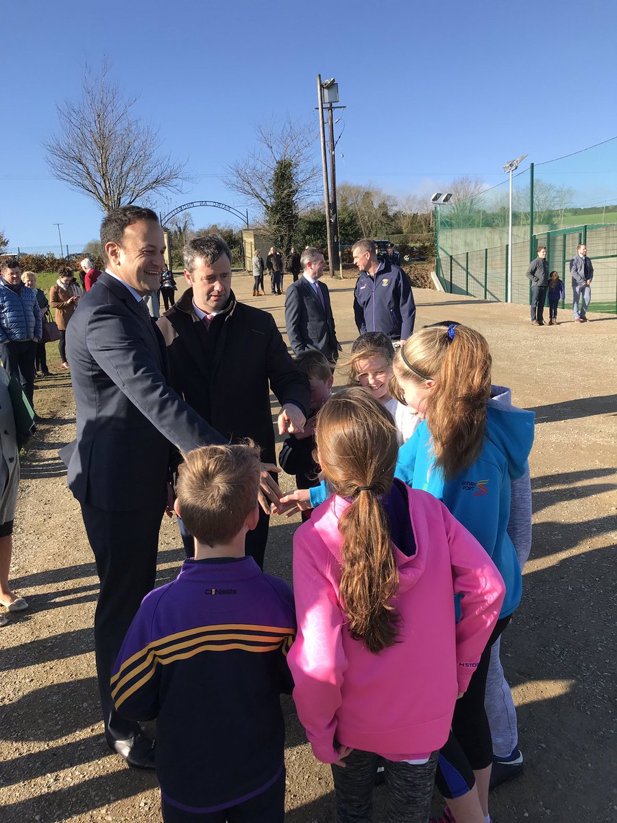 LeoVaradkar's tweet photo. In Kilanerin, Wexford on a beautiful day to open GAA All Weather pitch, National School extension &amp; Phase 2 of  Community Centre https://t.co/cQI3D8JDzw