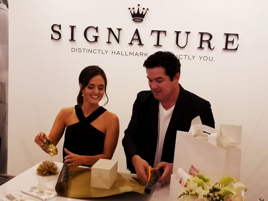hallmarkchannel's tweet photo. Wrapping gifts with the new #HallmarkSignature gift line! @danicamckellar @deancain @Hallmark https://t.co/U3VrG8bGJL