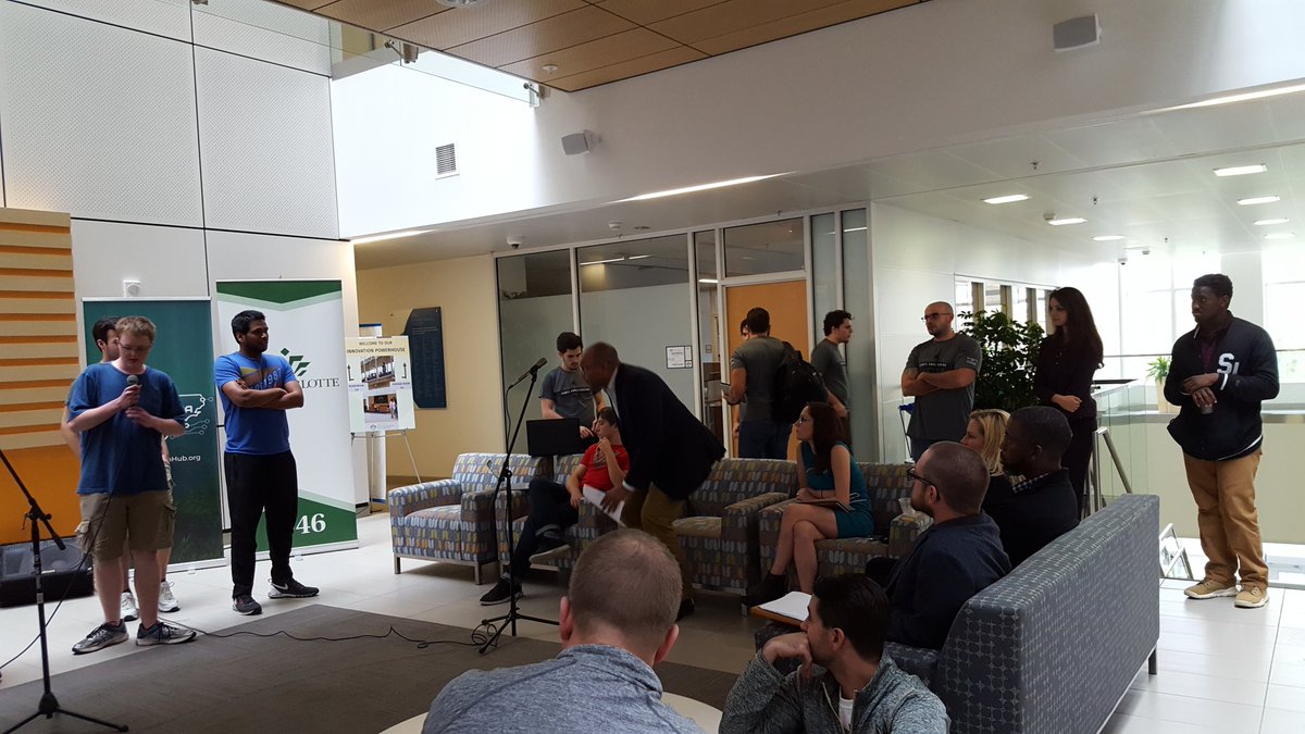 mwoollen's tweet photo. #cfhhackathon @CarolinaFintech #sharktank judges and participants excitedly engage with working mobile solution. https://t.co/xP3tYiEX1W
