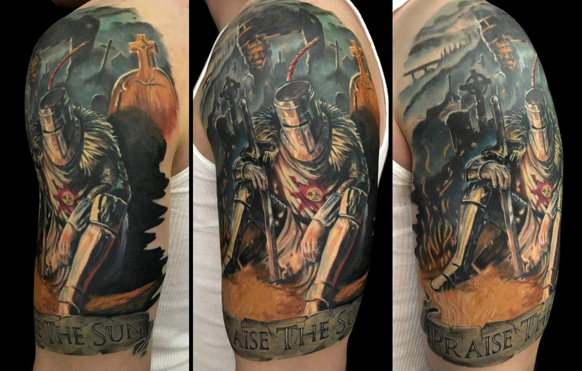 Dark souls praise the sun tattoo.