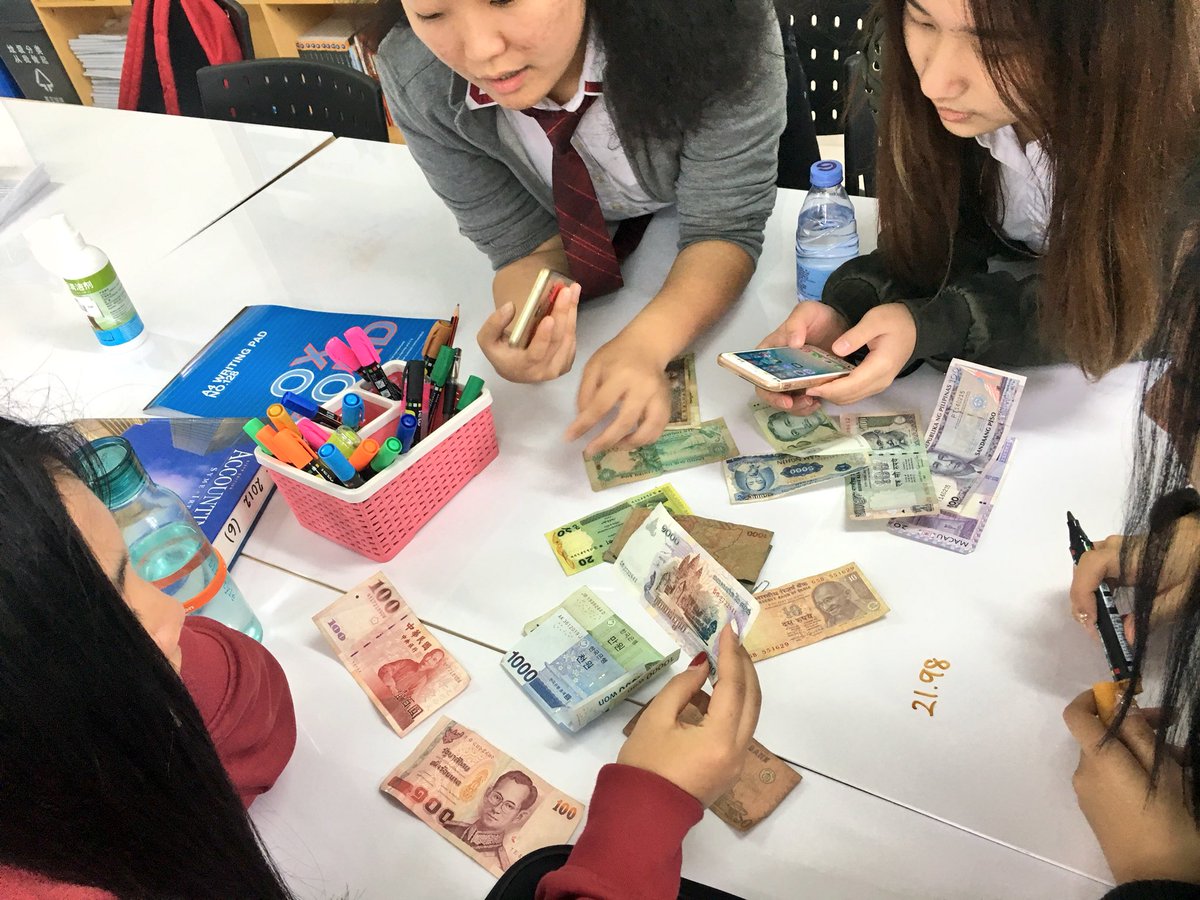 DPEconChappy's tweet photo. Students exploring different currencies from a variety of countries around the world 🌏💷💴💵🌎 #GoISNS #IBecon #IB #ExchangeRate https://t.co/vagZFwZQHR