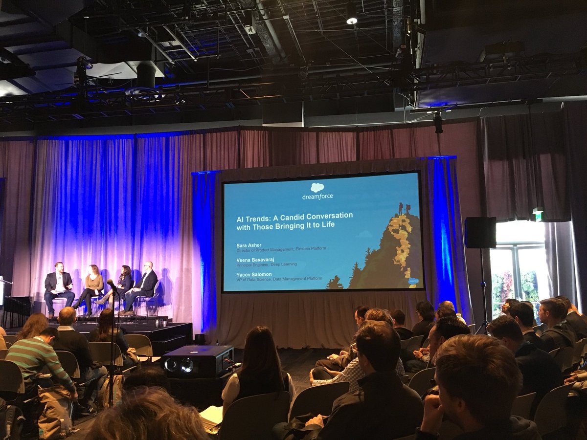 MichaelEMachado's tweet photo. First session at #Dreamforce2017 - “Candid convo with AI implementors”.  Veena Basavaraj and Sarah Asher killing it as expected. #einsteinai https://t.co/Bj2ct0QT9x