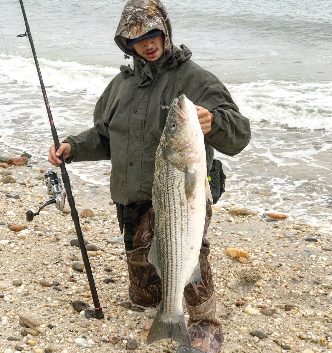 SubmsnOutdrs's tweet photo. @CaptPio with some nice stripers in bad weather last week on #Longisland north shore https://t.co/XIEQ6vNAAD