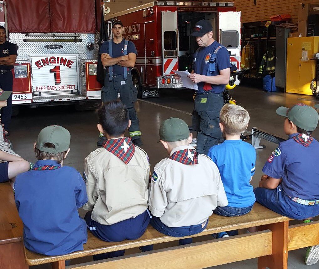 SacFirePIO's tweet photo. Cub Scout Pack 128 Den 7 visited Fire Station 1 yesterday, and got a first aid lesson from the firefighters there. #firstaidbadge https://t.co/MB0yxK8VK5