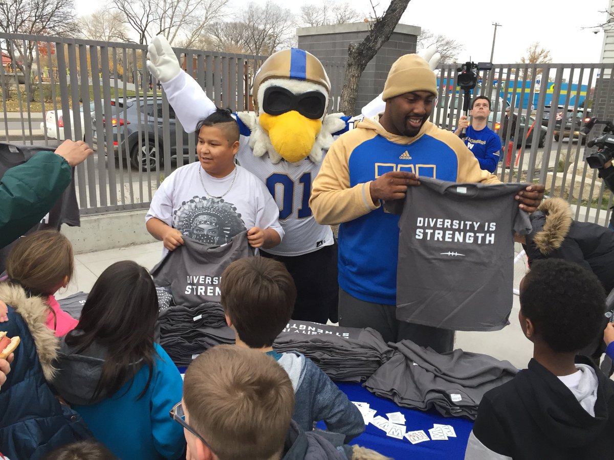 UnitedWayWpg's tweet photo. Winnipeg Blue Bombers &amp; friends are recognizing diversity and delivering cool shirts to our agency partner IRCOM today! #DiversityIsStrength https://t.co/WK729ouiZC