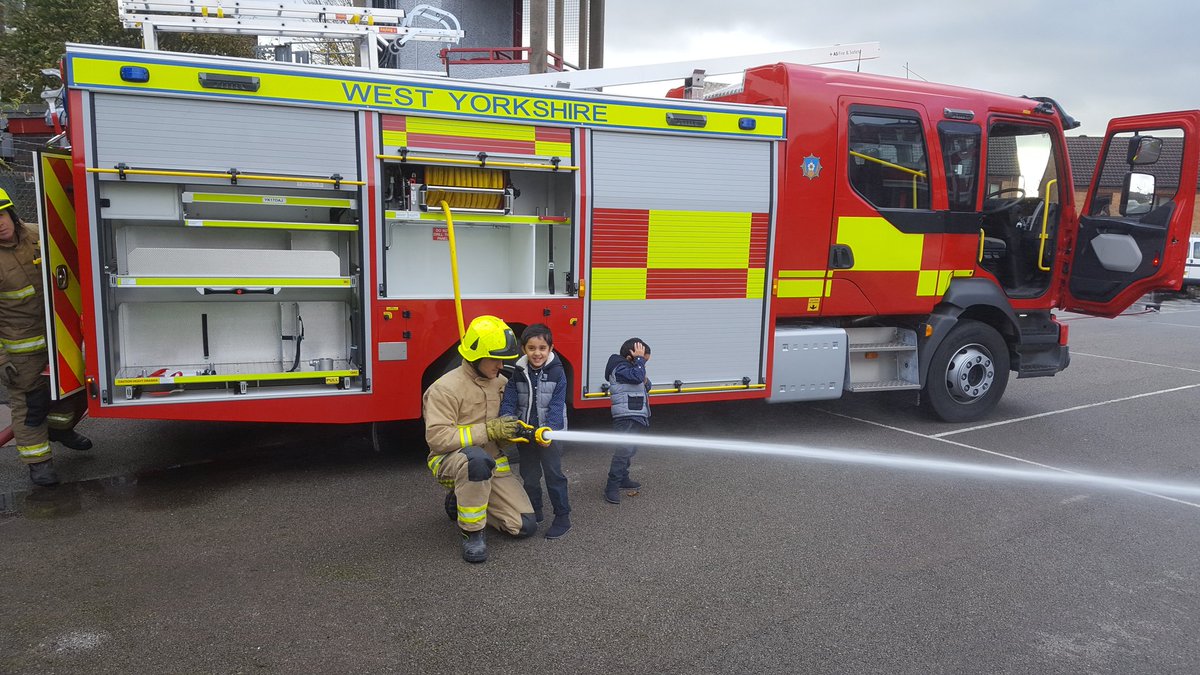 WYFRSAbid's tweet image. Two potential future #firefighters visiting Odsal station today to complete part if their school project. #engagement  #lotsofquestions 👍🚒