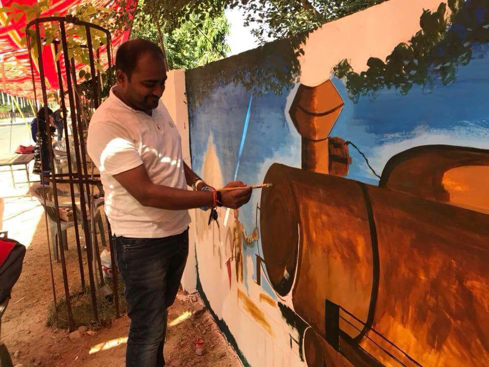 DrmAjmer's tweet photo. Painting gallery titled 'Rail Museum on Wall' on Rly sports ground walls  showing heritage of Rlys developed in association with students https://t.co/srv9gb50Ks