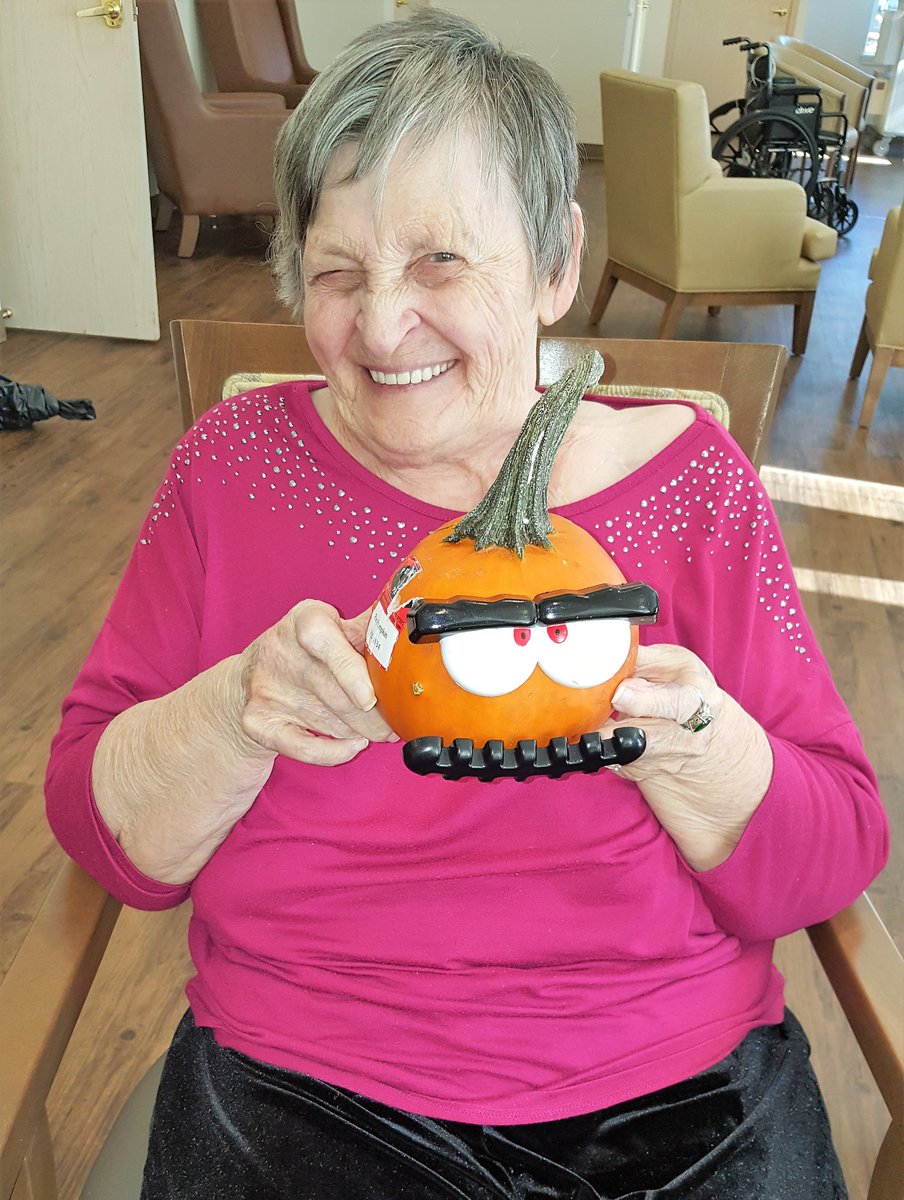 BaysideALF's tweet photo. @Bayside_Terrace Silly jack-o'-lantern decorating going on in Memory Care, with Audrey, Shelly, and Margret displaying their creations! https://t.co/JrSaZwn7Nw