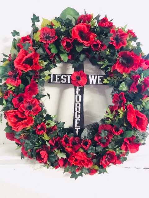 stable444's tweet image. " lest we forget" bespoke poppy wreath specially made for the window of The Livesey Funeral Service