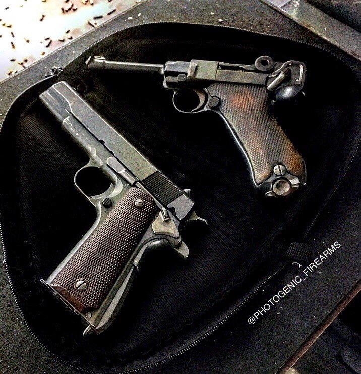 2 old foes, side by side at the gun range.