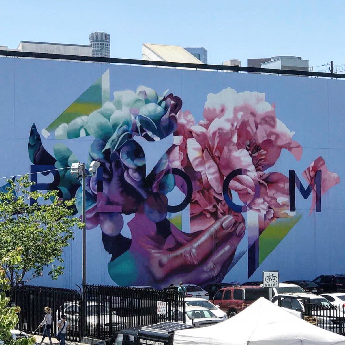 Margo_Brando's tweet photo. In the heart of the Arts District hunting for a warehouse for our awesome new @weplaynet venture - suggestions? Here's a stunning mural... https://t.co/9XwpxcaYxb