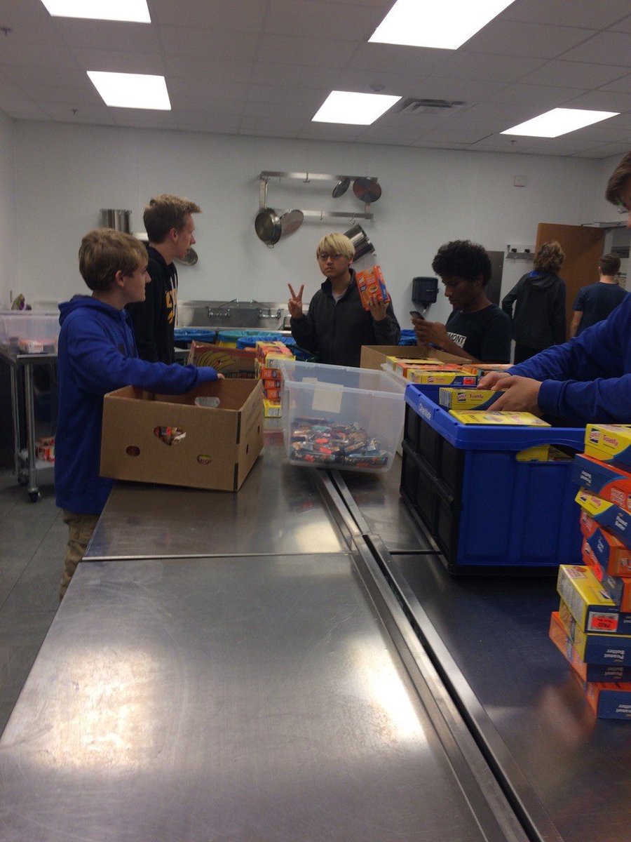 NWHSDECA's tweet photo. DECA Club works at the Backpack Ministry! https://t.co/BkQ27FZycg