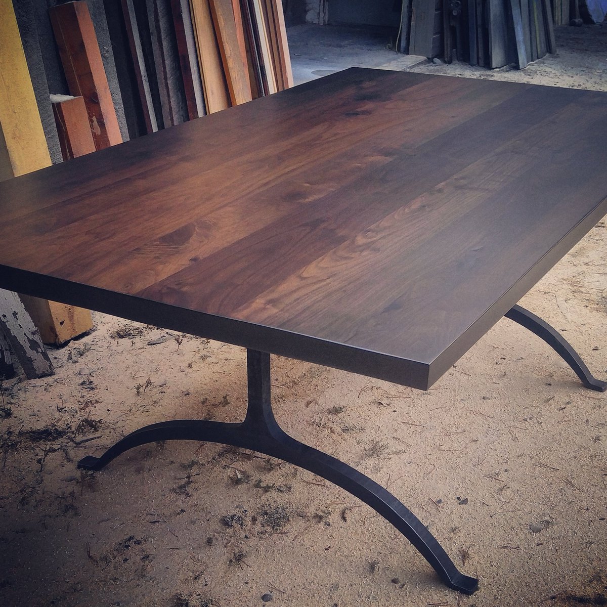 EchoPeakDesign1's tweet photo. Walnut table with hand forged steel wishbone legs. https://t.co/asFO00loOy