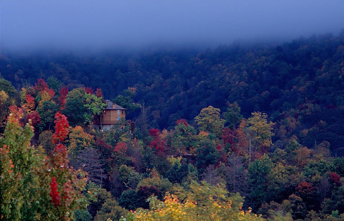 DeltecHomes's tweet photo. #TBT to a #Deltec in Maggie Valley taken from a helicopter in 2006. Needless to say drones have made our lives much easier #WNCfall #WNC https://t.co/JMFMHnDeJo