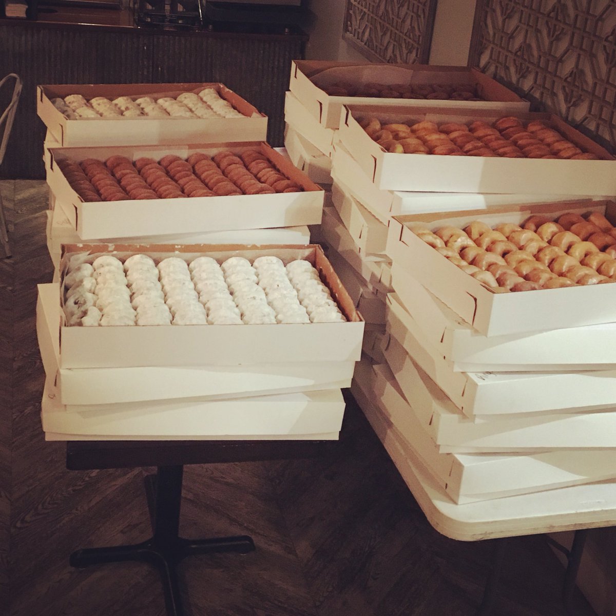 This is what over 2000 handcrafted scratch donuts look like. They will be given away tonight for trick-or-treat on the town.