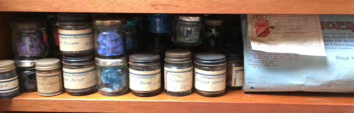 CSmithEnamel's tweet photo. Starting to unpack into new studio. Had to include tribute shelf to enamel past #oldjars #handwrittenlabels #wengers #oldpaperwork https://t.co/4f6ck81i6y