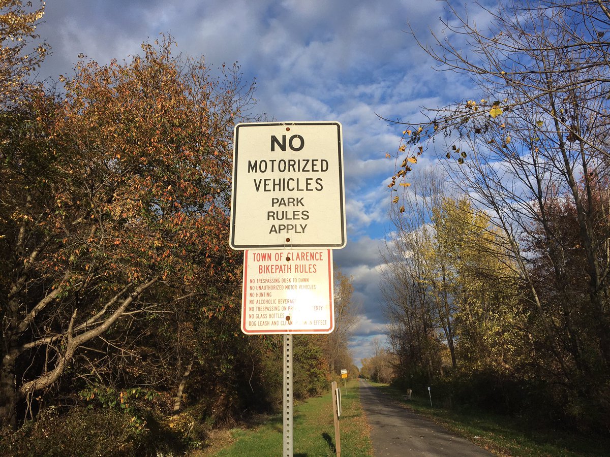 Jeffslawson's tweet photo. Here is the sign at the Gunnville RD entrance to Clarence bike path. A girl died this morning during an ATV accident here Sat night @WKBW https://t.co/9wKWQxppOr