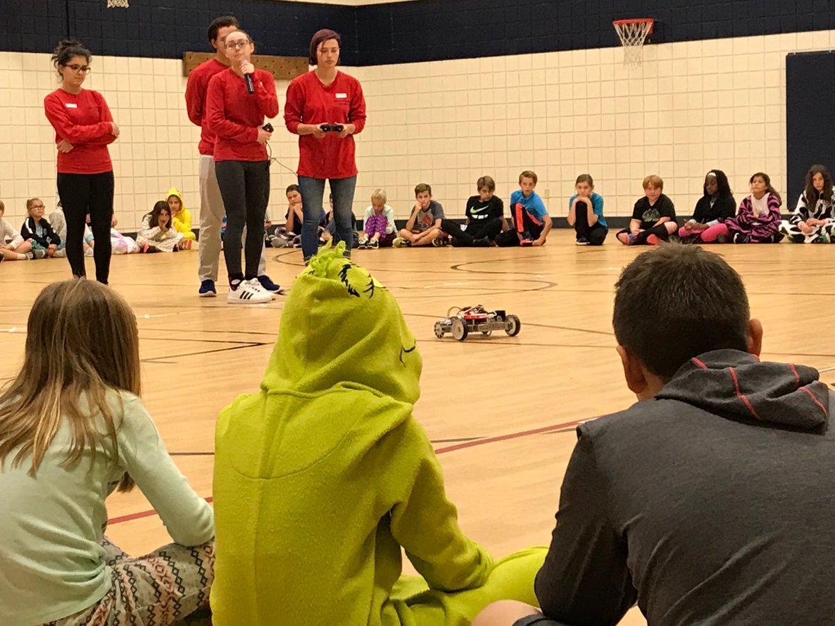 esmith_eric's tweet photo. #eurekarobotics team is giving an impressive presentation to our #Geggie tigers. #wearerockwood #STEM  #edtech https://t.co/oUQbC3wPkz