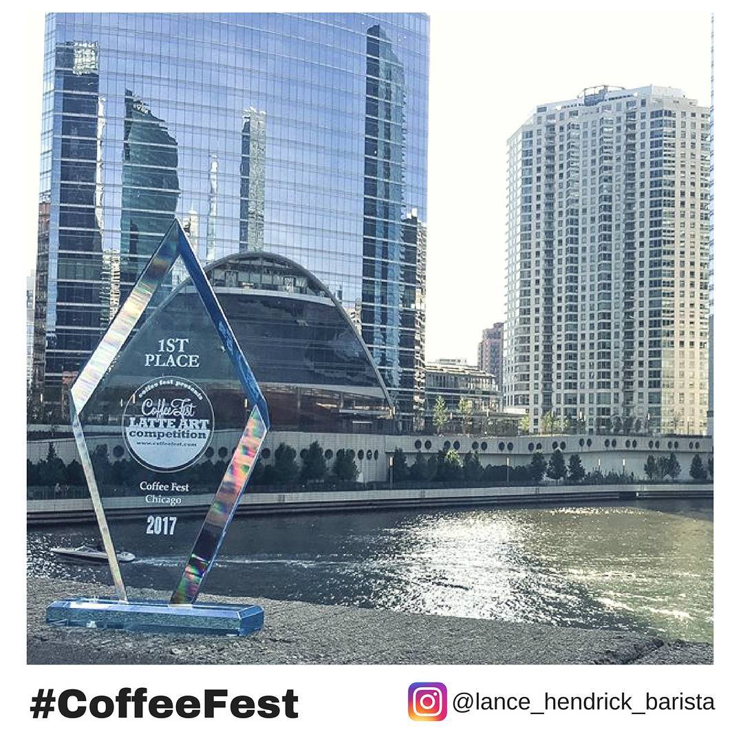 CoffeeFestShow's tweet photo. 🏆 Look what we found!  #Winner of the #LatteArt World #Championship Open at #CoffeeFestChicago 2017 
📸 Lance Hedrick of Memphis, TN 
#TBT https://t.co/voYe18PjiJ