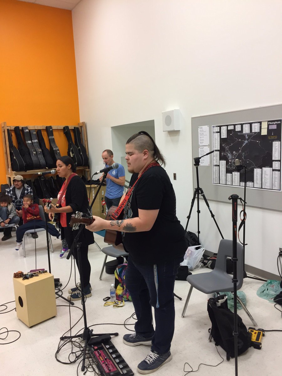 Musicians Binaeshee-Quae Couchie-Nabigon, @Cale_Crowe &amp; Glen Caradus play a song at our music workshop for #indigenousyouth in #Pikangikum.