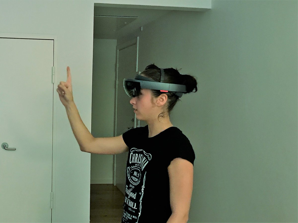EvePardi's tweet photo. Playing a little #RoboRaid with #HoloLens before going to sleep! :D #MSPROCKS #HoloGirl #ILoveMyProfession https://t.co/OkEFqCGWrL