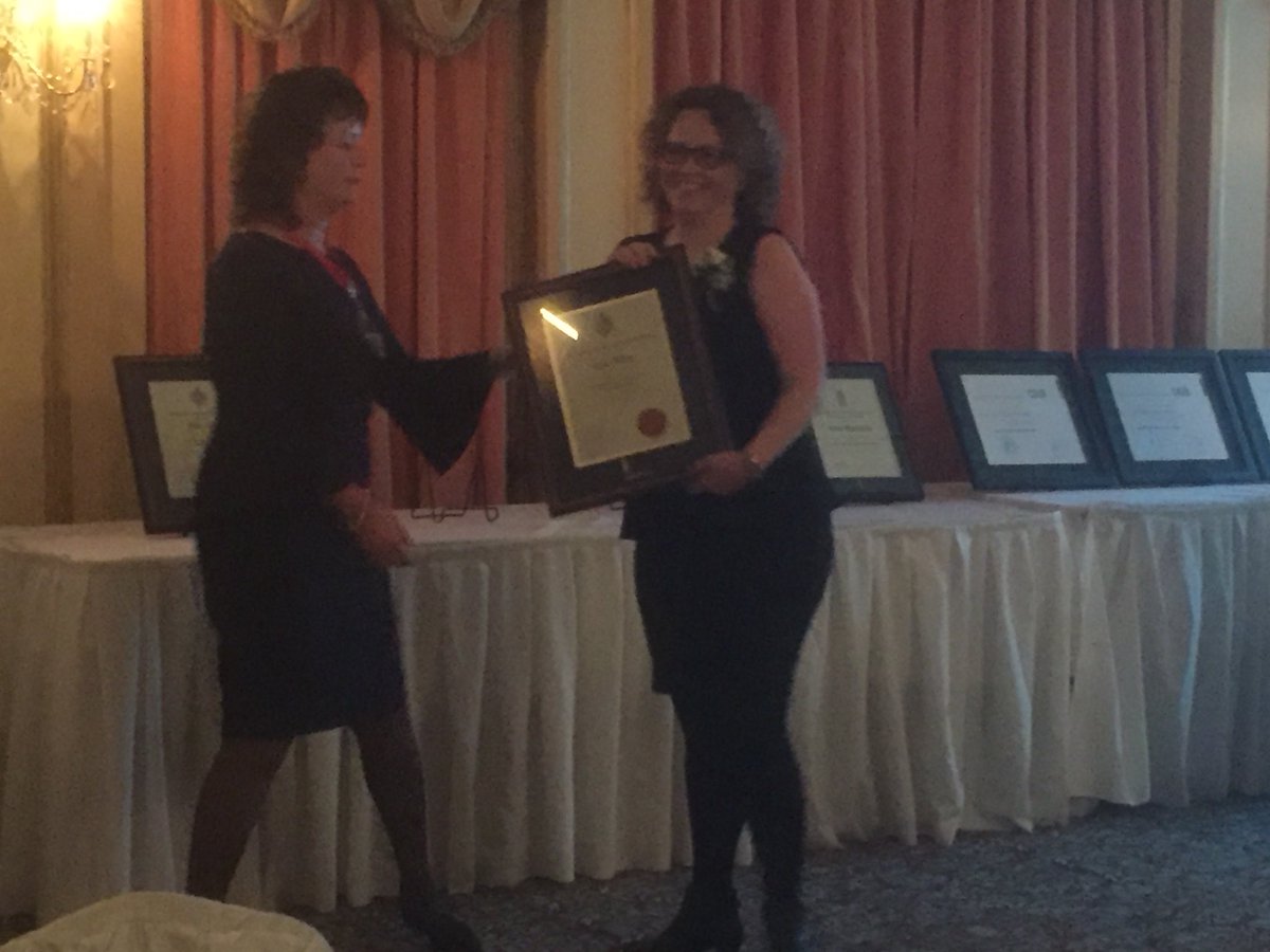 InsuranceInsPEI's tweet image. IIPEI’s newest CIP Grads receiving their certificates and CIP pins from @InsuranceInsCA Chair, Lynn Oldfield #IICGrad2017. Congrats!