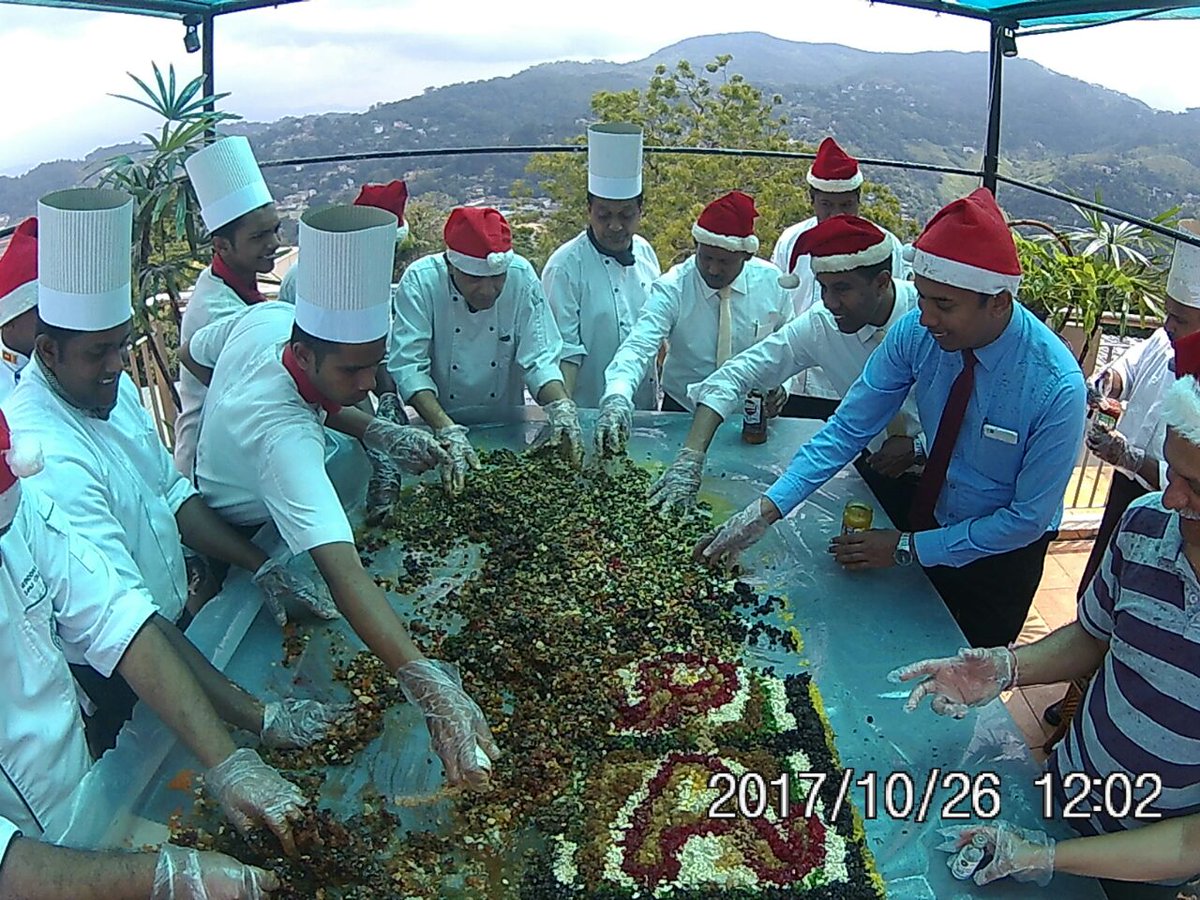 hoteltopazkandy's tweet photo. Hotel Topaz/Tourmaline started the festive season early. All hotel chefs &amp; some guests got together in the  mixing of Christmas Cakes. https://t.co/TI8GxUhAUs