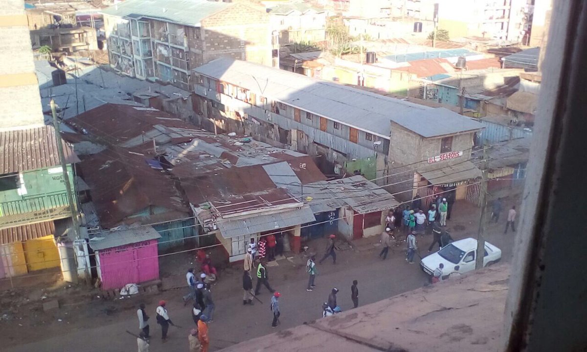 Mungiki have invaded Kawangware with Pangas and Machetes, they are attacking Residents #ElectionBoycottKE #KenyaPoll