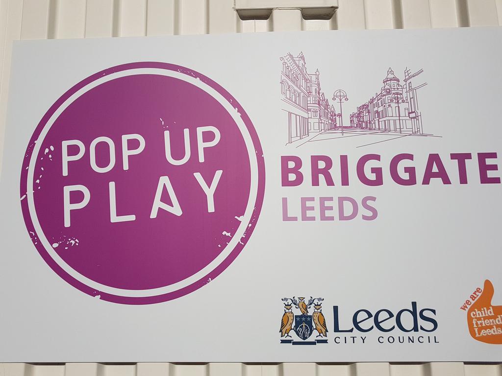 Leeds_City_Ctr's tweet photo. Sun's out fun's out 🌞 #BriggatePopupPlay Here on Briggate until 4pm today and over the weekend. All free events including a climbing wall! https://t.co/eQNN97t6QG