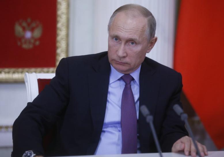 Reuters's tweet photo. Putin, as part of test, oversees launch of four nuclear-capable missiles: Ifax https://t.co/h12DCMzrBo https://t.co/M3vadQixn2