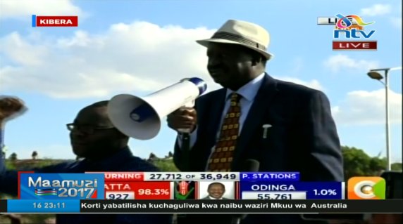 ntvkenya's tweet photo. Nasa leader Raila Odinga, accompanied by Kibra MP Ken Okoth, addresses supporters in Kibera, Nairobi. #Decision2017 https://t.co/UHn8gxFeFK