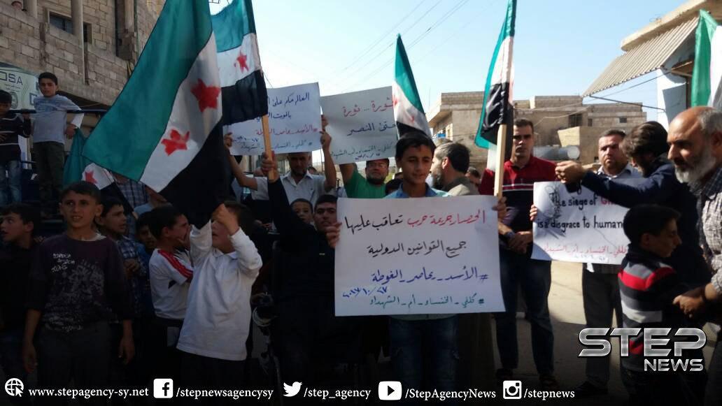 FSAPlatform's tweet photo. #Syria || Rural #Idlib

Banners from Killi village demo:

"Siege is a war crime punishable by International Law"

#AssadBesiegesGhouta https://t.co/kQ5unWslev