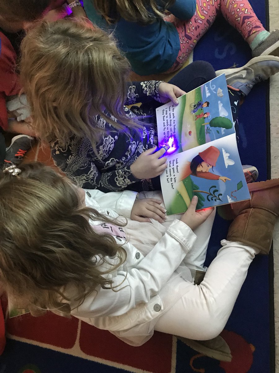 First grade is enjoying tracking their reading with finger lights during FLASHLIGHT FRIDAY!#NHSSD #littlestlions #FRIDAYfun