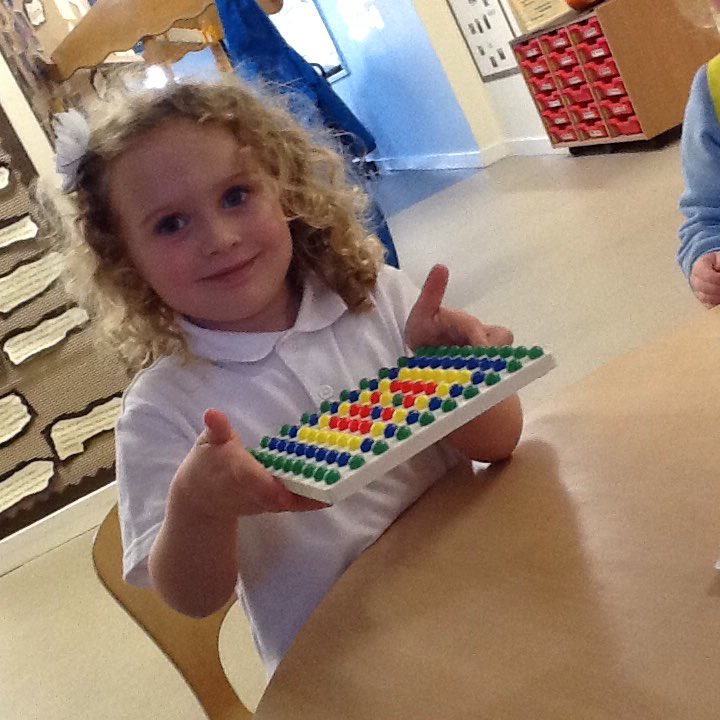 This girl spent a long time creating this beautiful pattern today with the pegs!