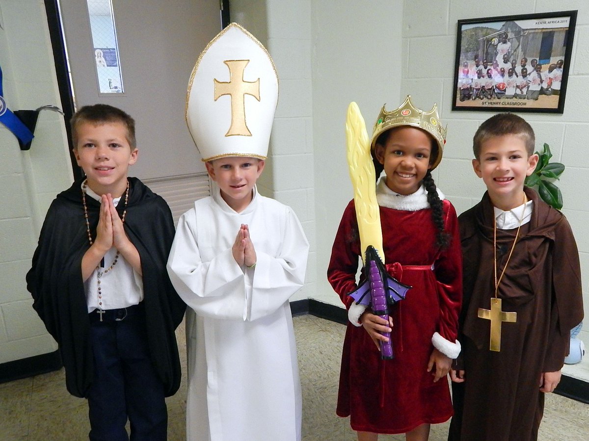 sthenryschool's tweet photo. St. Henry third graders each chose a saint and did a report.  They also dressed as their saints .@sthenryschool https://t.co/ReTVj6uarF