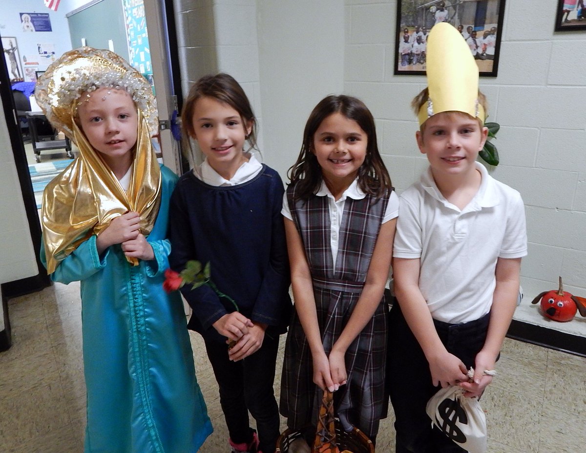 sthenryschool's tweet photo. St. Henry third graders each chose a saint and did a report.  They also dressed as their saints .@sthenryschool https://t.co/ReTVj6uarF