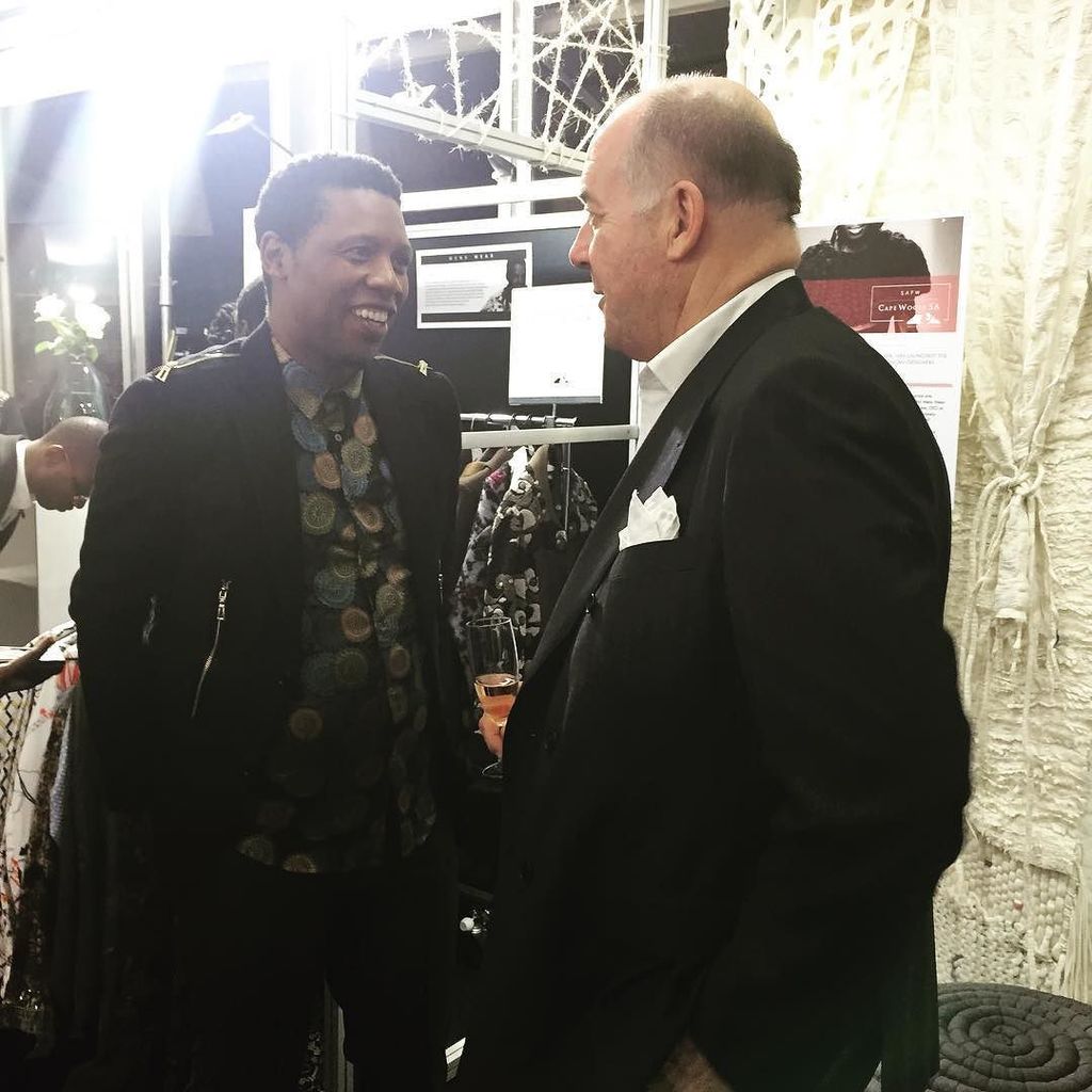 safashionweek's tweet photo. @ephymol with Peter Ackroyd at the #CapeWoolSA stand at @sandtoncitymall #SAFW #AW18 https://t.co/yubwW90tpG https://t.co/lMJ2xbvXLI