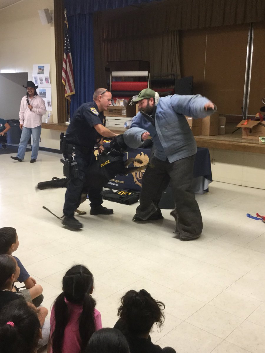 gkruip's tweet photo. Amazing Red Ribbon assembly at Arbolita! Police officers and police dog teach important lessons to our students. https://t.co/LQhQc7GPQC
