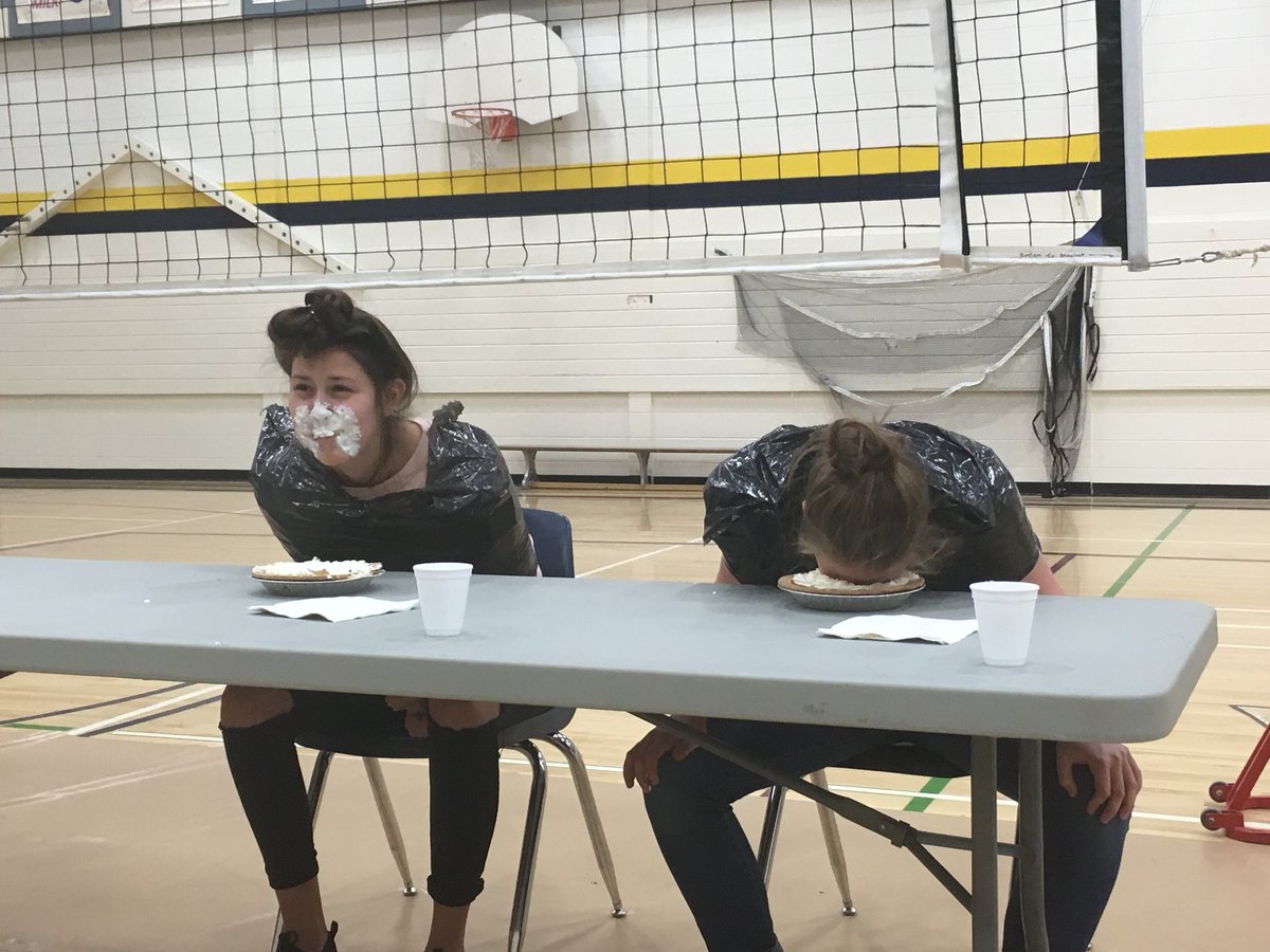 Lang and Mindus competing in the pie eating contest!