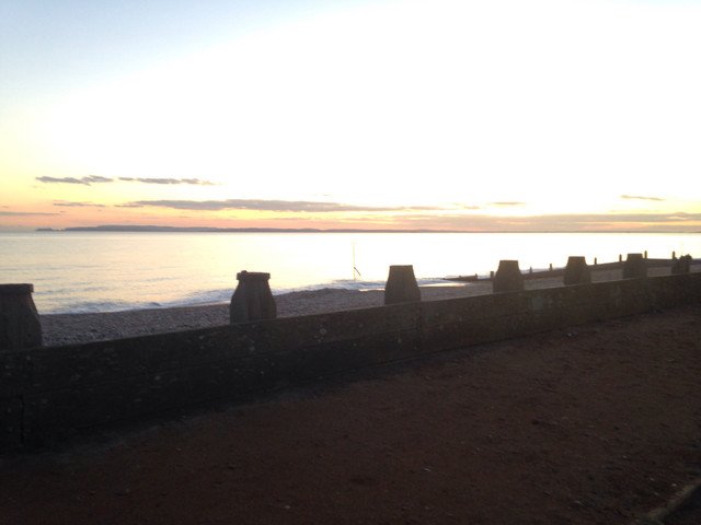 Giving in to the stereotypes and ordering my first ever #UK Fish &amp; Chips. Dinner &amp; #sunset #view from #England South Coast 
#beach #travel