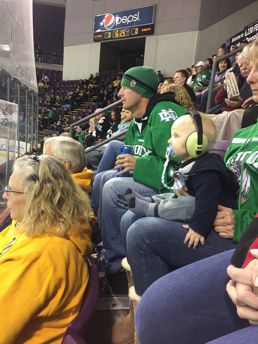 Arborflash's tweet photo. Newest Sioux hockey fan, like Dad like Son #SiouxHockey. https://t.co/sYtQvNIjdC