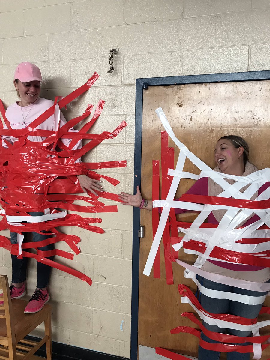 NicoleFancera's tweet photo. @FordsMiddleWTSD #PINKOUT to support breast cancer awareness! @JamieParryFMS #1wtsd #humanribbon #stuckforabuck #wearpink https://t.co/yMVusbmPg7