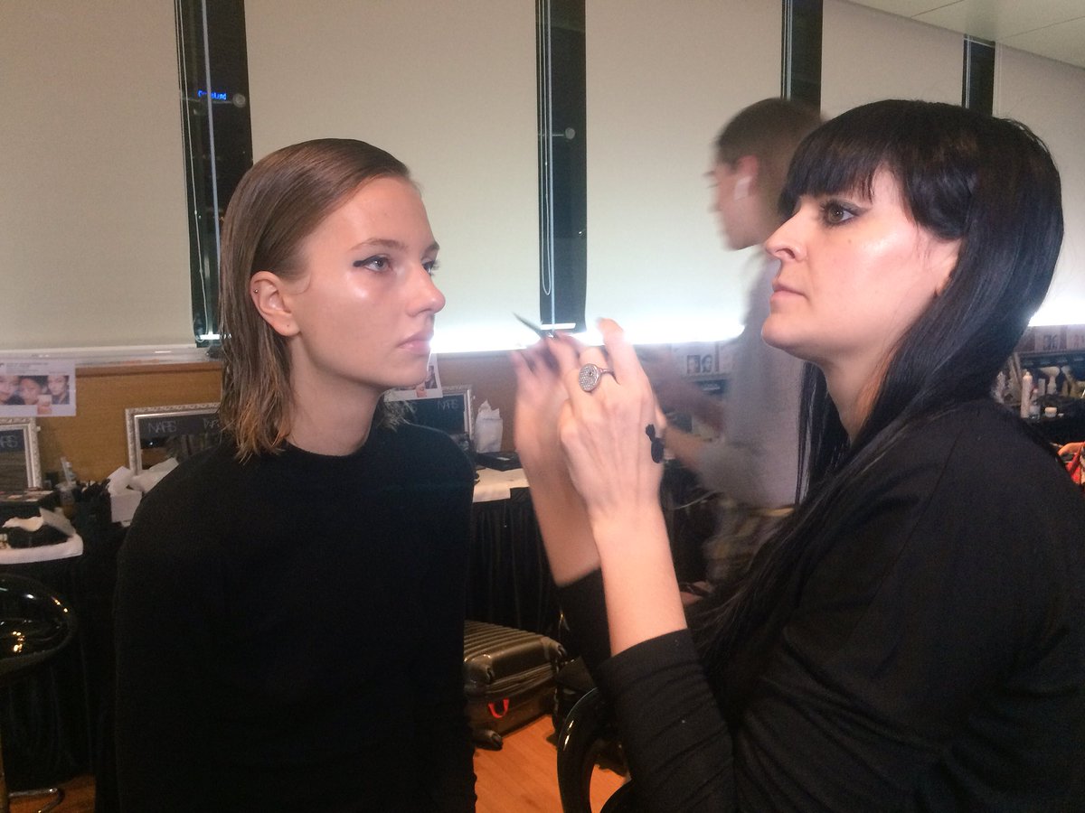 ST_LifeTweets's tweet photo. Models get the signature thumbprint eyeliner look just before the Jason Wu show at #SGFW2017 https://t.co/H9yySFS30u