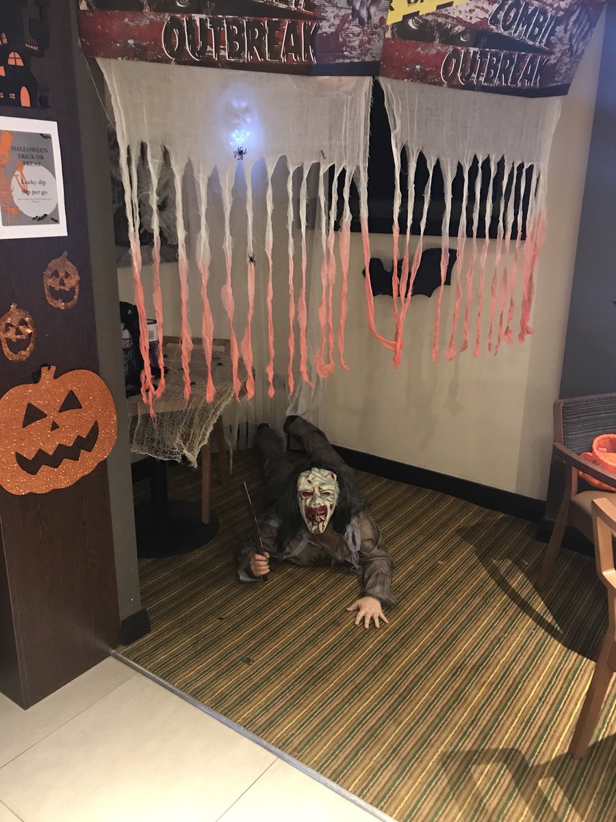 Creepy corner!! Complete with our own zombie!!! #halloween #scary #zombie #raisingmoney #gosh