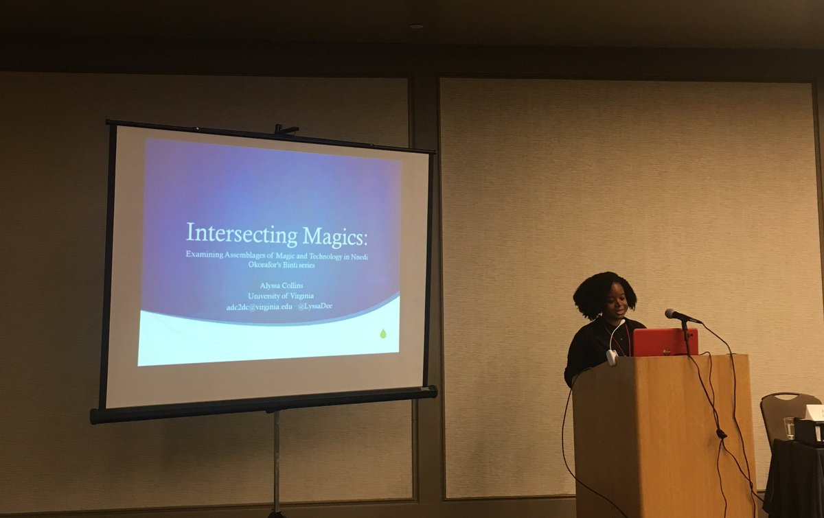.<a href="/LyssaDee/">Alyssa Collins</a> at her paper— Intersecting Magics: Examining Assemblages of Magic and Technology in <a href="/Nnedi/">Nnedi Okorafor, PhD🕷️</a>’s BINTI series #sirens17