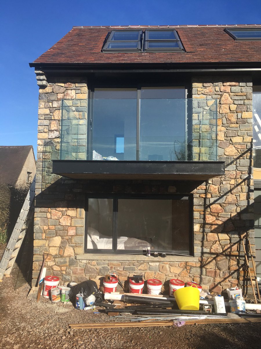 Cantilevered balcony with frameless balustrading, one of our projects nears completion.
