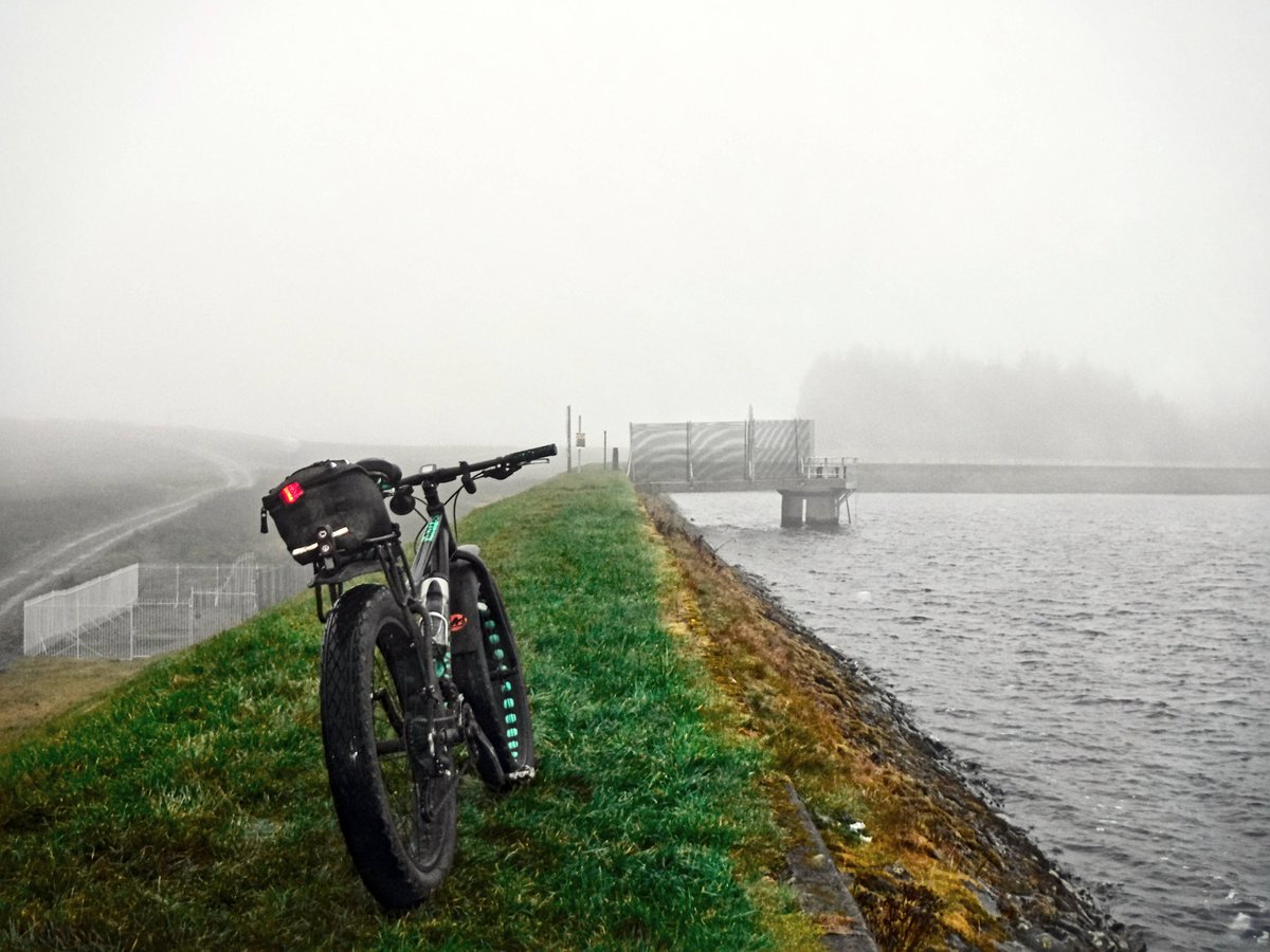 1r5's tweet photo. #Fatbike parked up at #LochHumphrey on top of the #KilpatrickHills today. Much clouds, rain and wind. #cheapcamera #Darktable https://t.co/NF0rFtxDc9